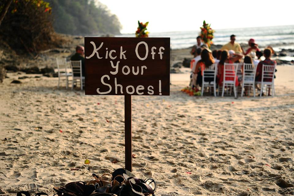 Kick off your shoes beach sign
