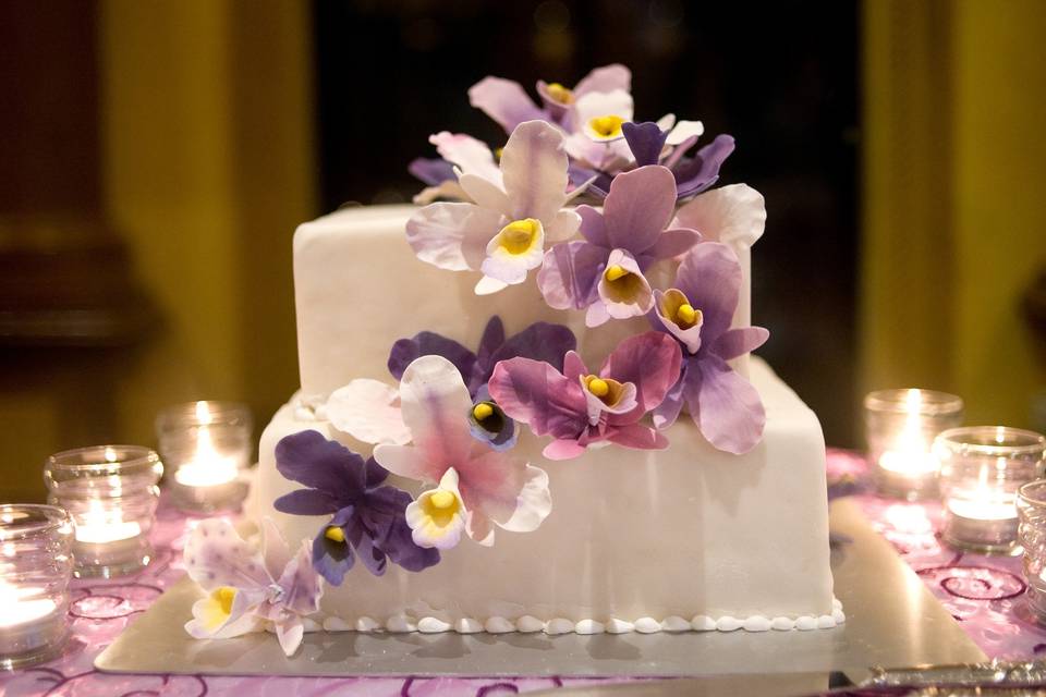 Purple and ivory wedding cake