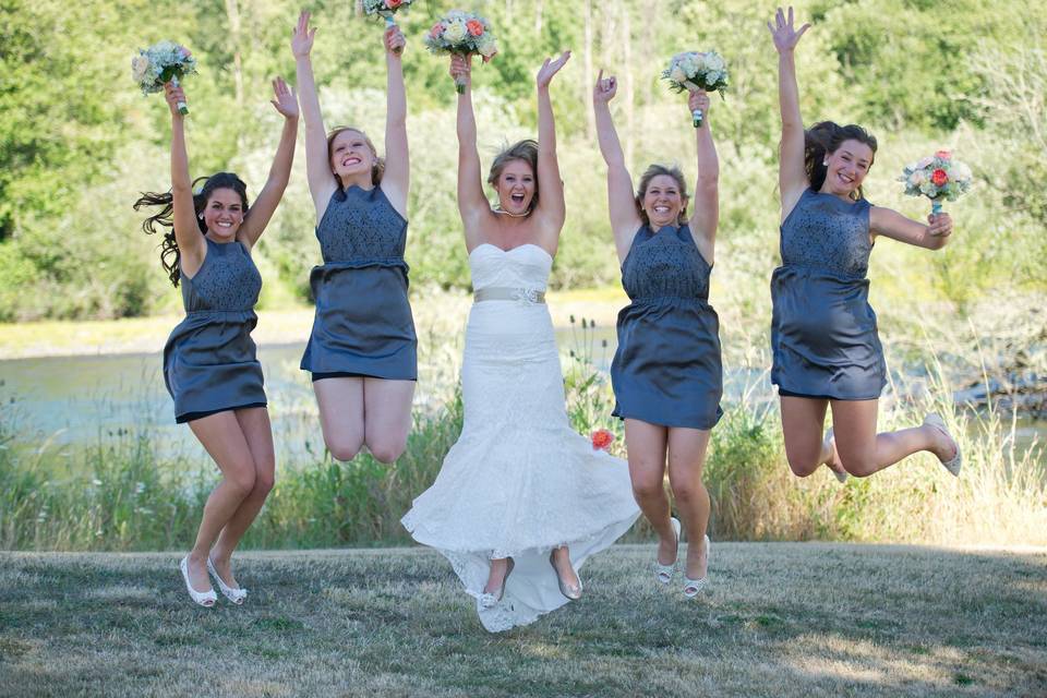 Jump shot of the bride and bridesmaids