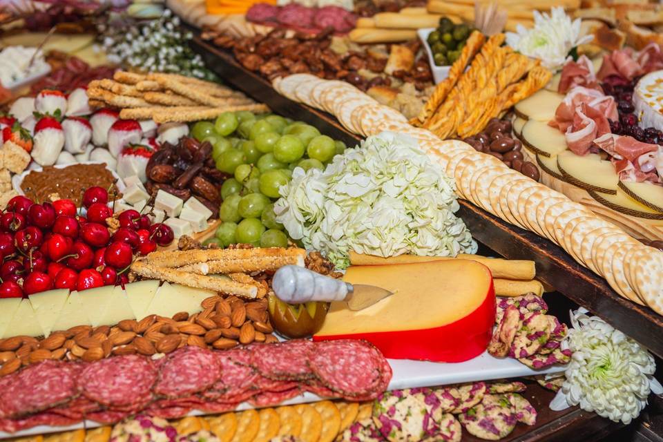 Cheese, meats, and fruit display