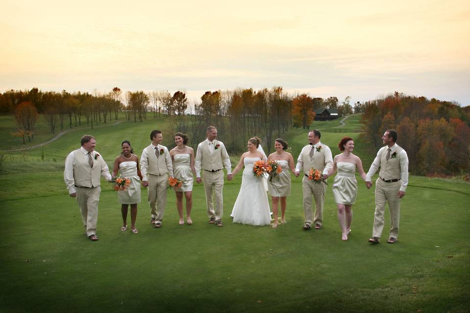 The couple together with their bridesmaids and groomsmen