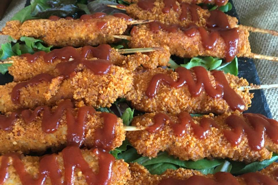 Almond-crusted chicken skewers