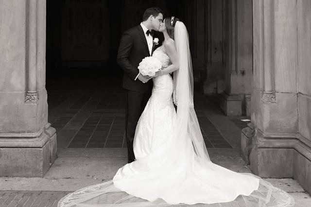 Couple kissing under the archway