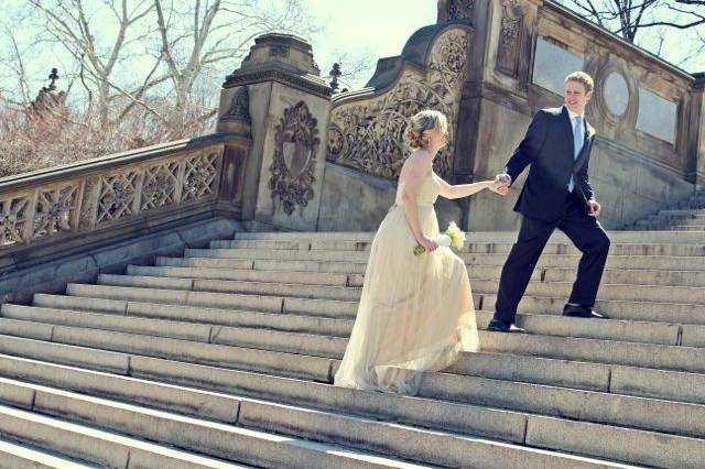 Couple ascending stairs