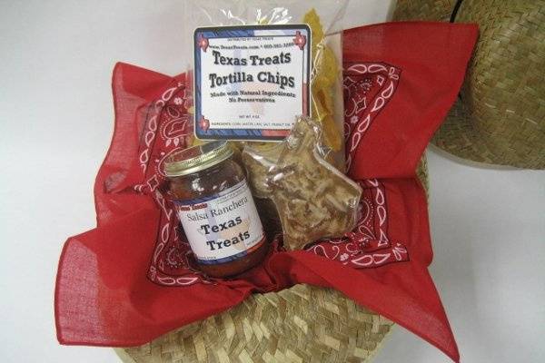 Bring out your inner wrangler!  This cowboy hat is filled to the brim with all sorts of Texas goodies!  Included in this basket:
Texas-shaped Tortilla Chips (4 oz.)*
Salsa Ranchera (8 oz.)*
Miss Susie's Southern Praline (2 oz.)
2 Texas Snack Mixes (assorted flavors