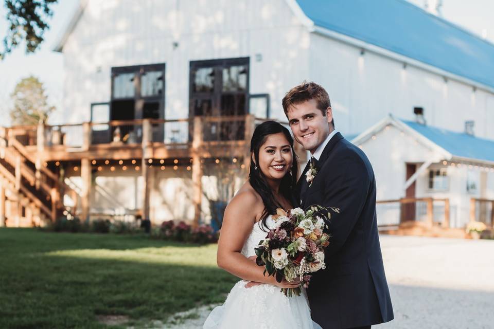 Wedding portrait outside barn