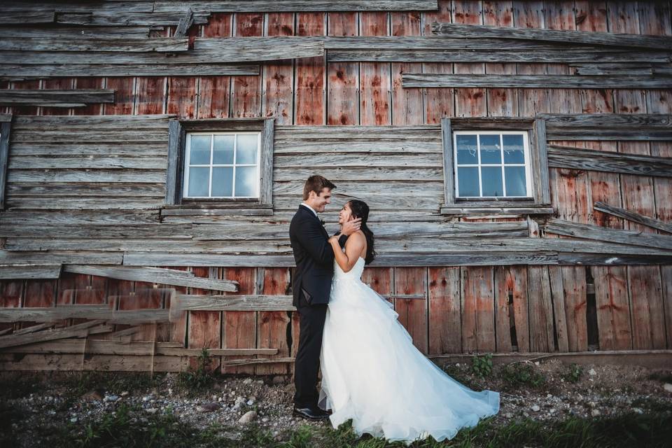 Couple in front of barn