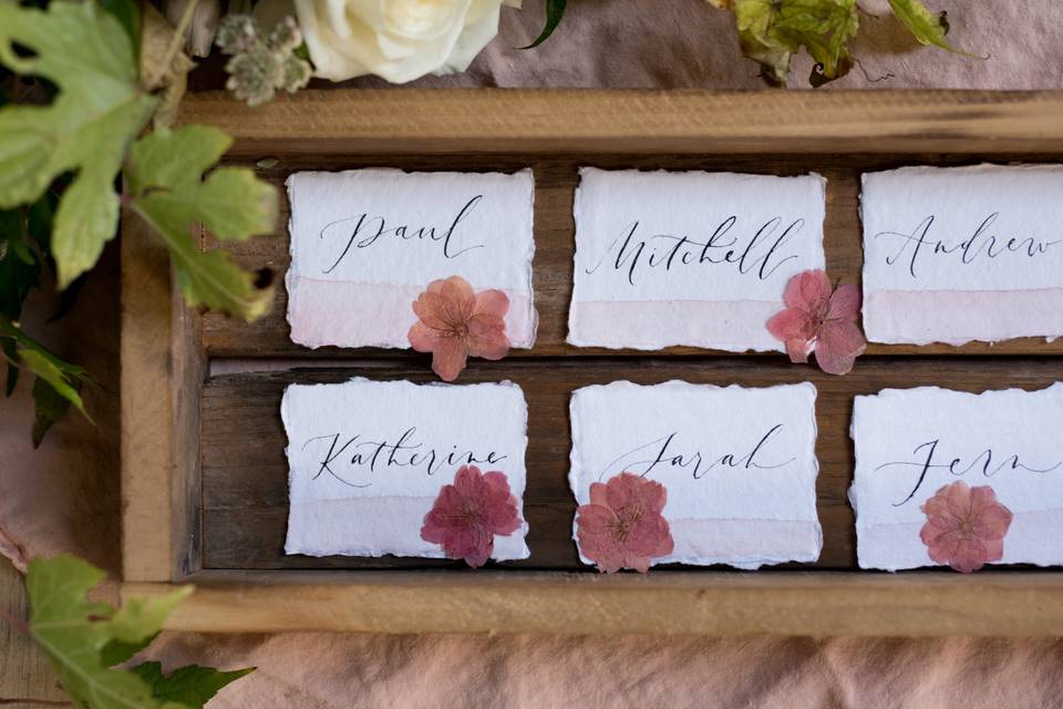 Personalized calligraphy escort cards