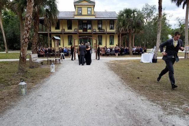 Bride and groom with their officiant