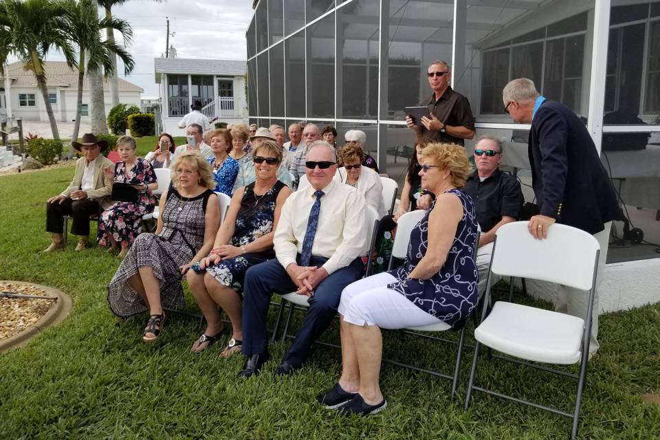 Bride and groom with their guests