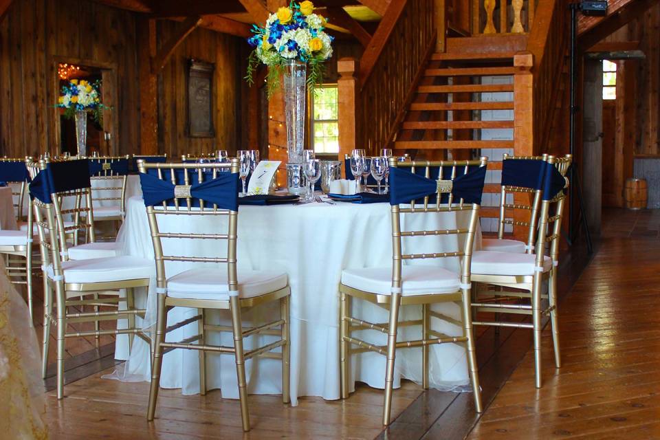 Barn Reception in Ivory, Navy Blue and Yellow.