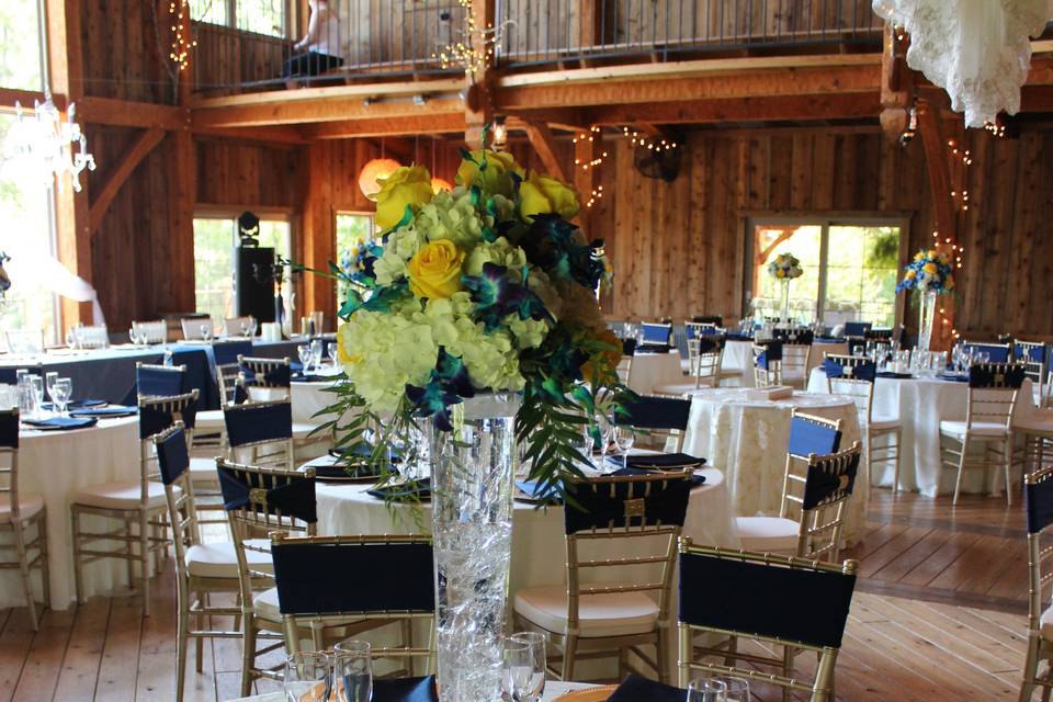 Barn wedding & reception in Ivory, Navy and Gold.