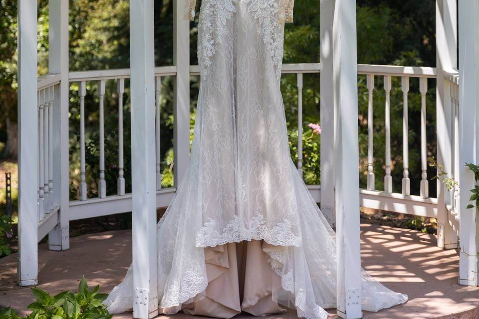 Bride's dress by the gazebo