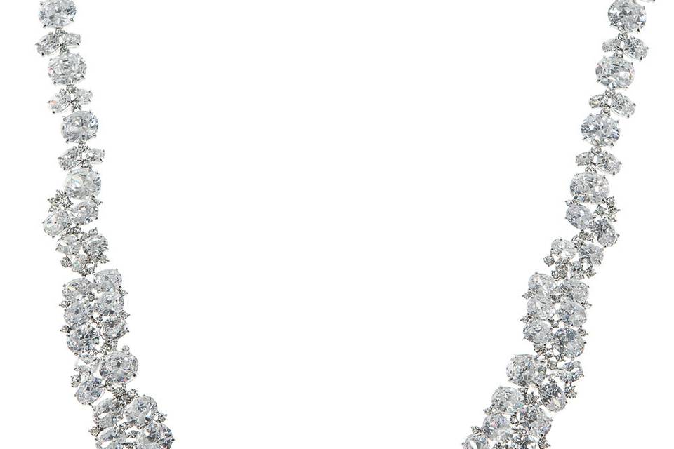 LEYLA CRYSTAL CLUSTER NECKLACE
Designed to sit on your collar bone, this hand made cluster necklace features cubic zirconia cluster setting on a rhodium plated base. It speaks glamour and allure for the bride who wants to sparkle. Pair this piece with earrings that fall right below the lobes for a softer yet eye-catching look.
http://www.delilahk.com/delilahkbridal/wedding-necklaces-35/leyla-crystal-cluster-necklace.html