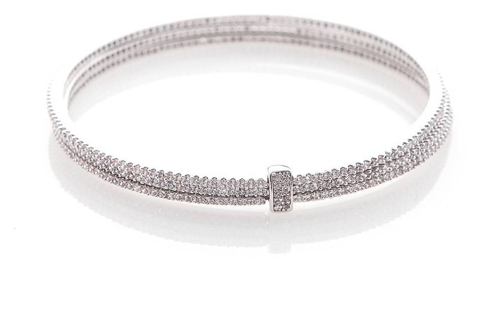 DELILAHK TRIPLE ROW CRYSTAL BANGLE
Delicate yet glamorous, this handcrafted crystal embellished bangle is a chic way to adorn a bare wrist. This rhodium plated piece can be worn alone or layered with crystal bracelets for a more alluring look.
http://www.delilahk.com/delilahkbridal/bridal-bracelets/delilahk-triple-row-crystal-bangle.html