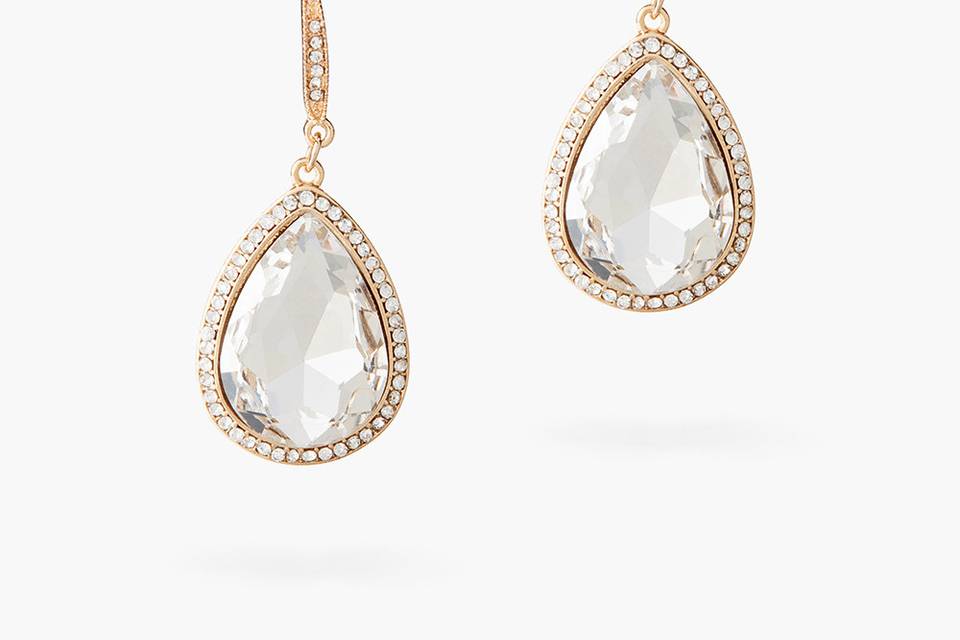 DELILAHK GOLD BOTTEGA CRYSTAL DANGLES
This pair of drop earrings is plated in gold and set with a pear-shaped crystal gemstones that hang delicately from a wire back hook. Let them add a captivating touch to day and evening ensembles.
http://www.delilahk.com/delilahkbridal/delilahk-gold-bottega-crystal-dangles.html