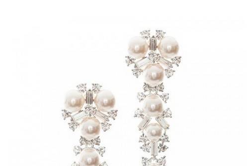 DELISA PEARL & CRYSTAL DANGLES
Speaking statement on their own, these simulated pearl and crystal earrings reflect Gatsby glamour. Embellished with rose colored glass pearls and crystal baguettes, the contrast between the two offers a beautiful sparkle to your visage.
http://www.delilahk.com/delilahkbridal/delisa-pearl-crystal-dangles.html