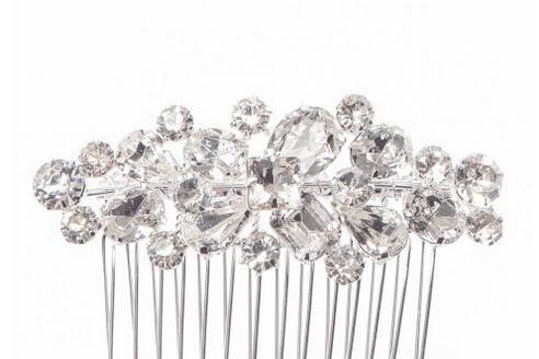 JANA CRYSTAL CLUSTER HAIR COMB
Evoking 1950s glamour, this intricate handcrafted hair comb is embellished with a cluster of marquis and round-cut crystals, adding the perfect touch of shimmer to your hairdo. A wonderful accent to your wedding veil, this hair comb is a bridal must-have.
http://www.delilahk.com/delilahkbridal/jana-crystal-cluster-hair-comb.html