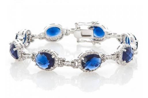 MAELYS SAPPHIRE CRYSTAL BRACELET
A truly classic gem, the sapphire blue Maelys bracelet is delicately hand set with the finest cubic zirconia stones on a rhodium plated base for a high quality finish. This colorful piece is sure to shimmer in any type of light. Wear it with crystal dangles for an overall alluring look.
http://www.delilahk.com/delilahkbridal/maelys-sapphire-crystal-bracelet.html