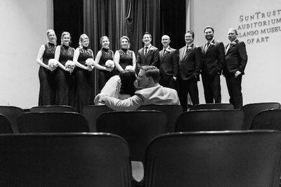 The couple with the bridesmaids and groomsmen