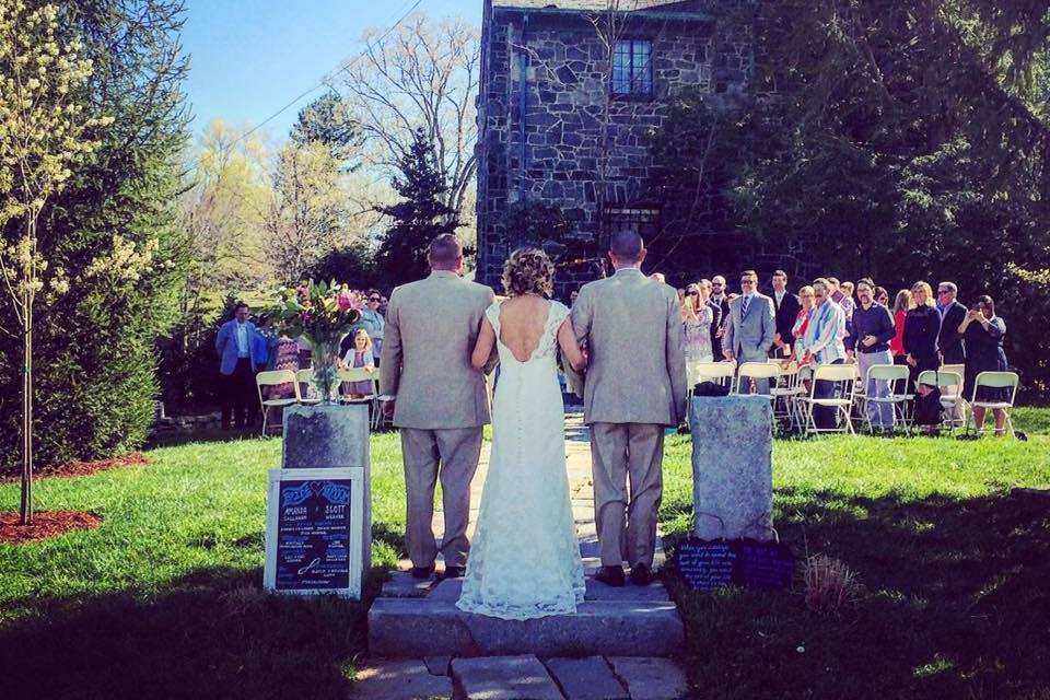 Spring ceremony in the garden at Homewood in Asheville NC. Coordination by Carolina Love Events