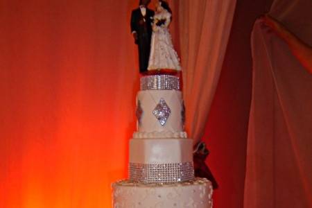 Five tier wedding cake--with beautiful couple cake topper, diamonds and shine galore!