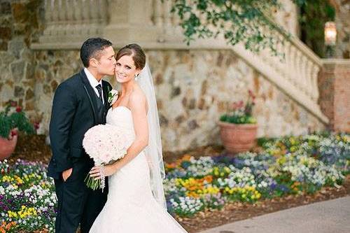 Groom kisses