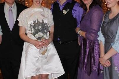 Our beautiful bride Morghan with her husband Ben and her parents and sisters.
Paper roses and dried lavender make up the bouquet.