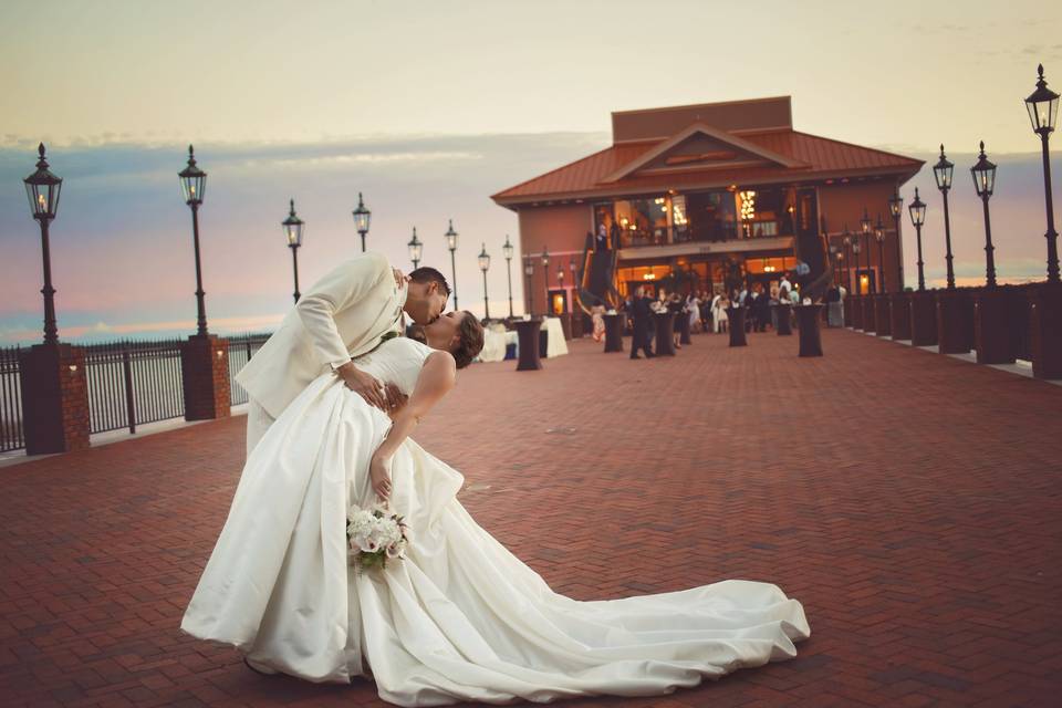 Groom kissing his bride