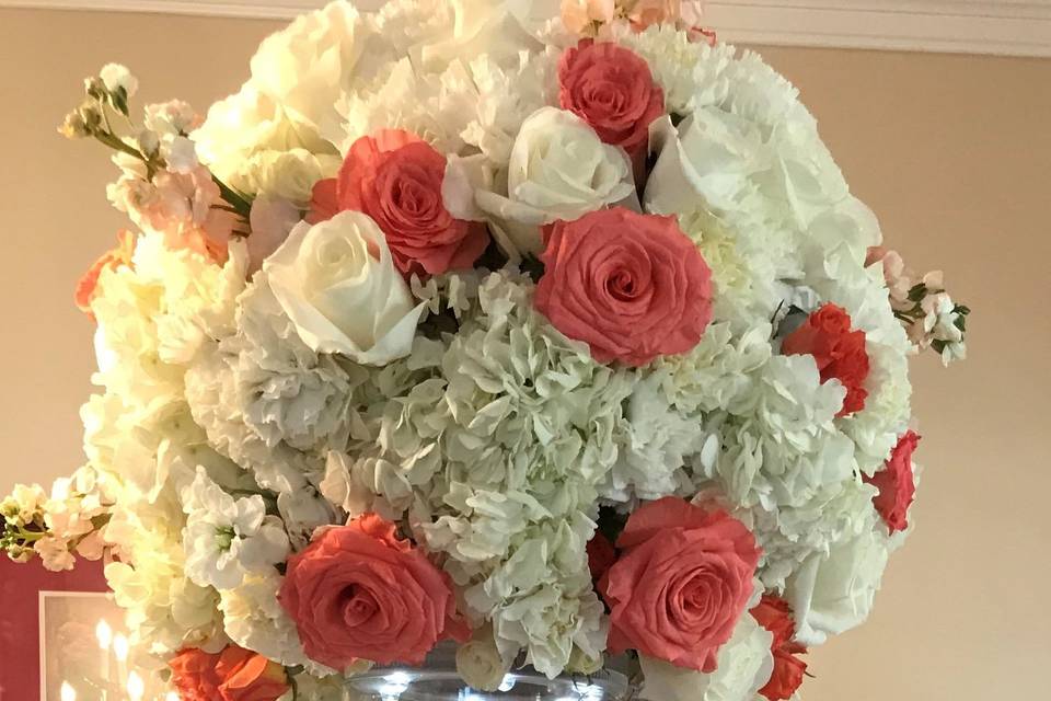 Tall Coral and White Centerpiece