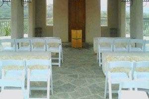 The small, open-air chapel has stone seating for 12, and chairs can be brought in to accomodate another 12-15. Standing-room capacity under the roof can accommodate 30 to 35. And another 60 to 65 would be able to view from the extended patio area.