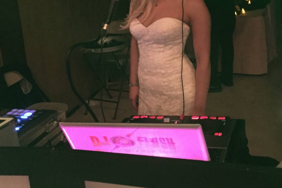 The bride at the DJ booth