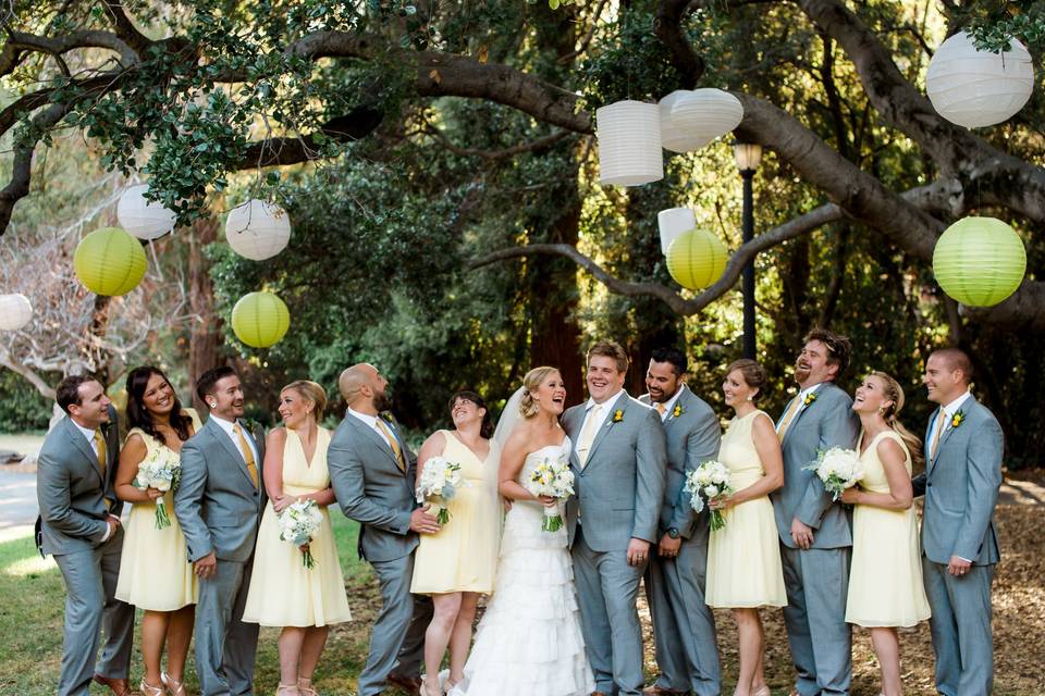 The couple with the bridesmaids and groomsmen