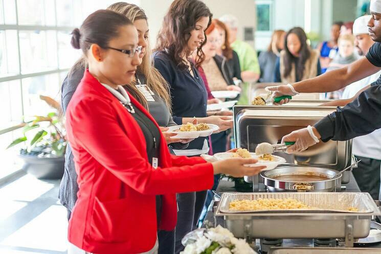 Waiters serving the guests