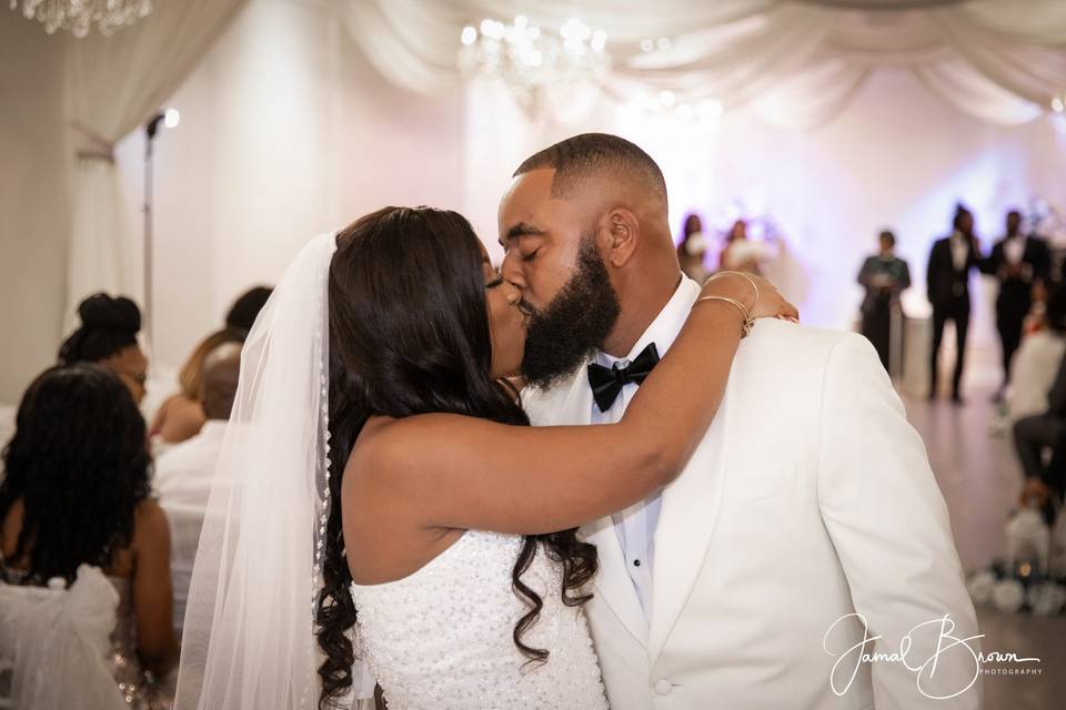Sharing a kiss as husband and wife