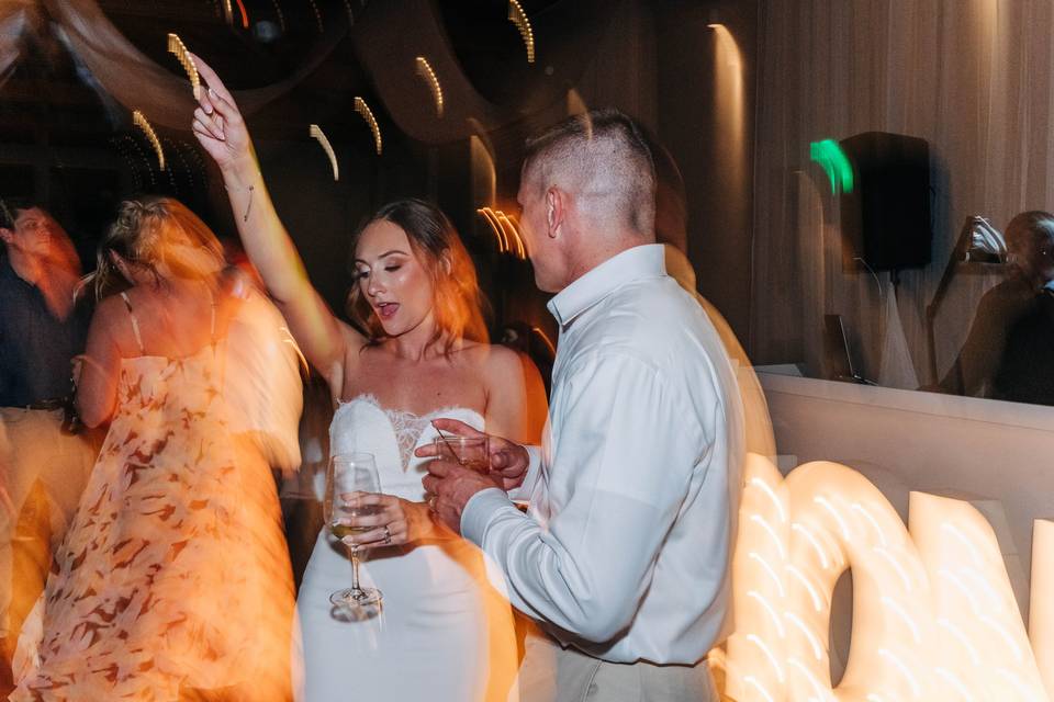 Bride and groom dancing