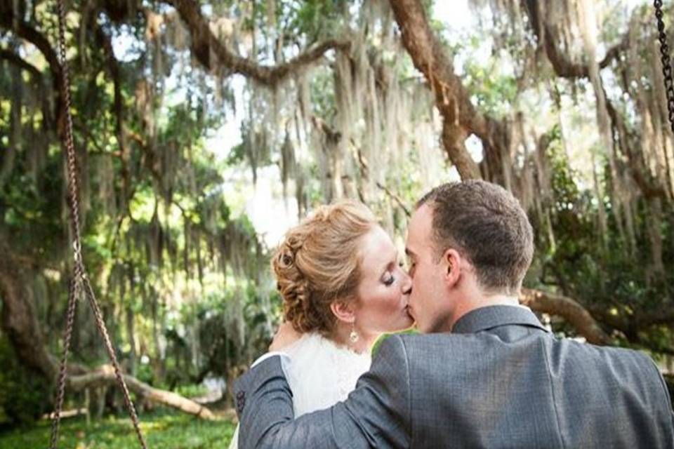 Perfect location for an outdoor wedding under the Mossy Oaks with the lake in the backdrop