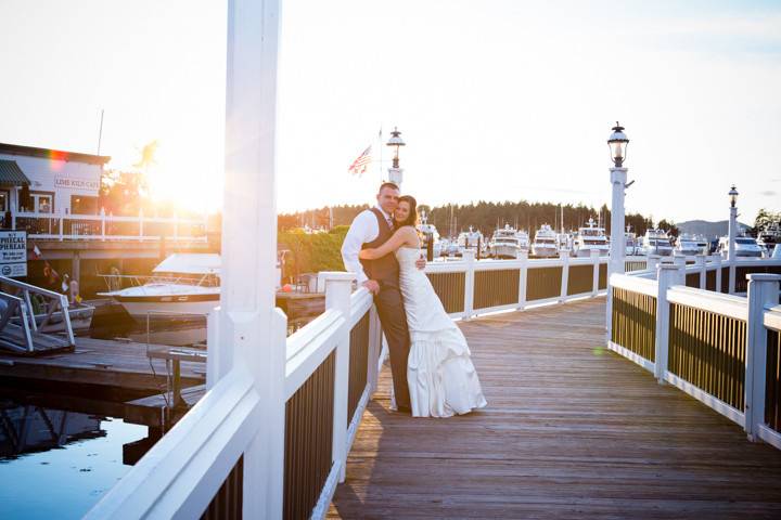 The golden hour at Roche Harbor - bride and groom on the dock