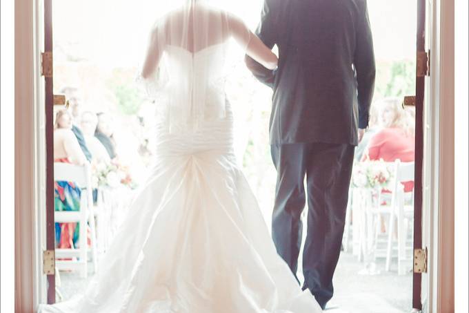 Columbia Winery - bride and father first going down the aisle