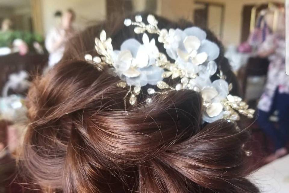 Flower updo - Top Knot Bridal