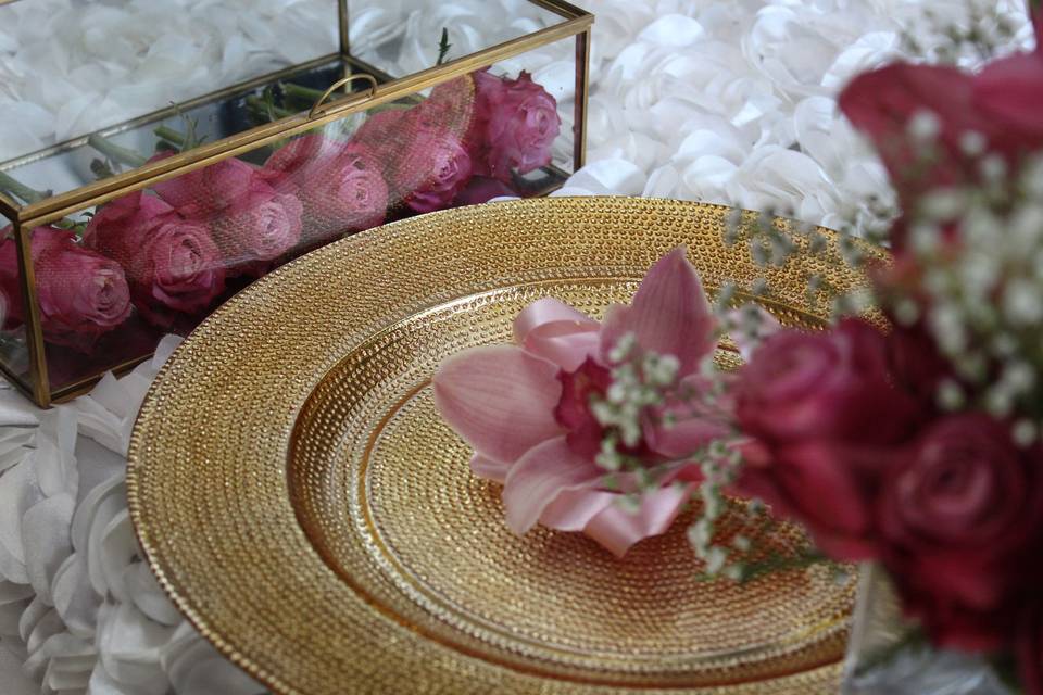 Gold glass charger plate with pink orchid