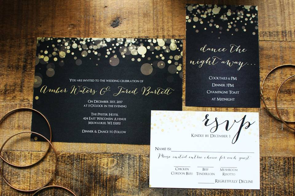 Black invitation with gold bits