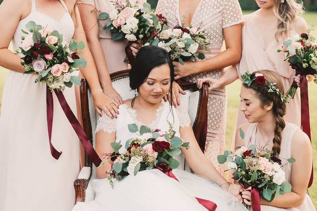 Bridesmaids around the bride