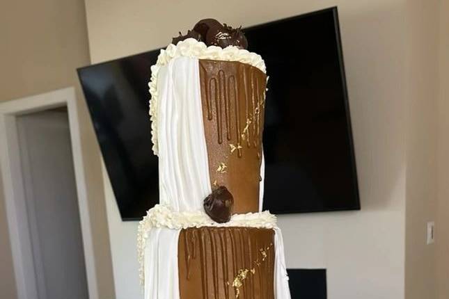 Three-tier chocolate cloaked in white