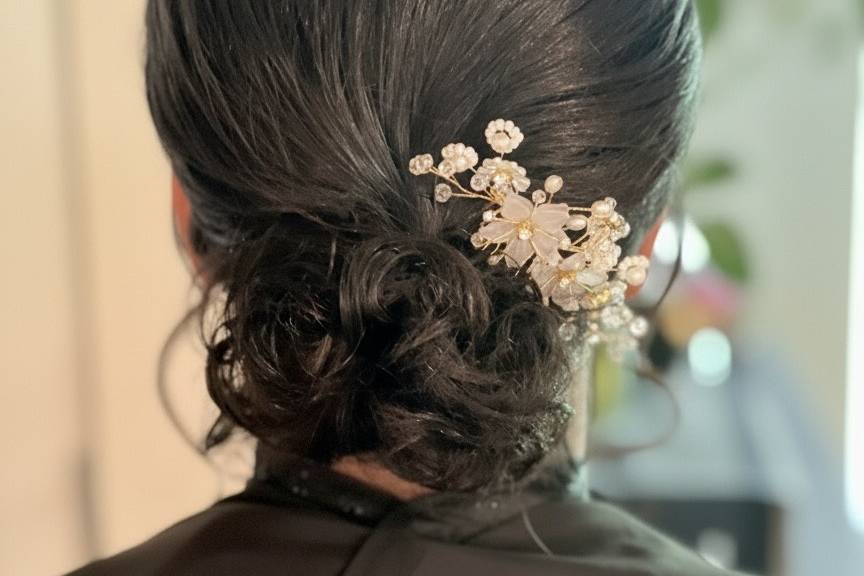 Low bun with soft curls