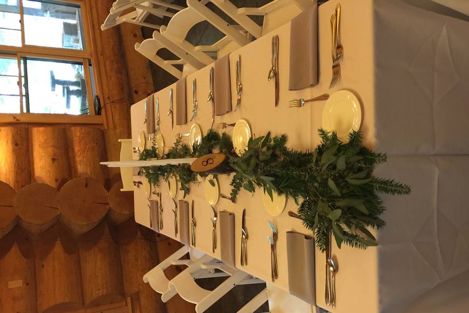 Table garland in place of a centerpiece. Wedding a Camp Fowler