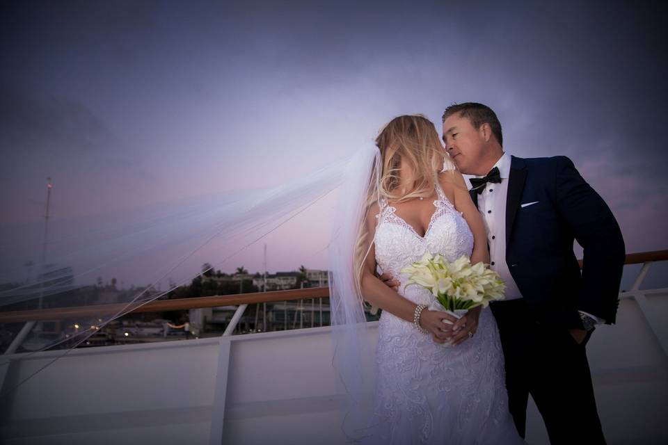 Bride and Groom during sunset on the bow deck of ICON