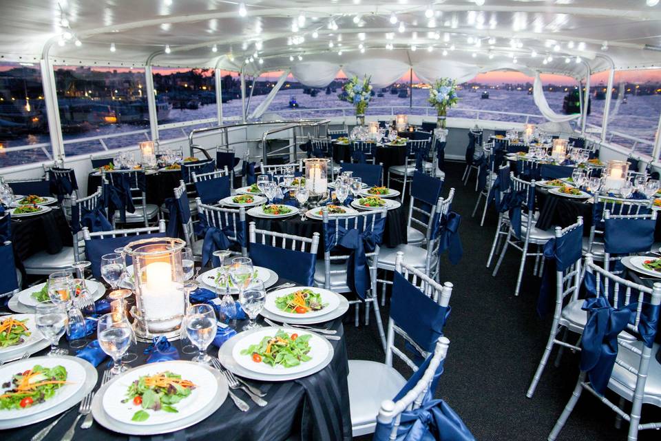 Dinner setup at sunset aboard the yacht ICON