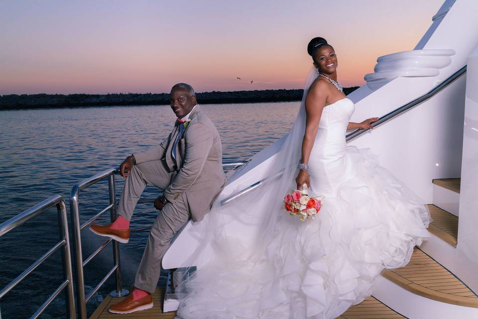 Bride and Groom having fun on the ICON during Sunset.