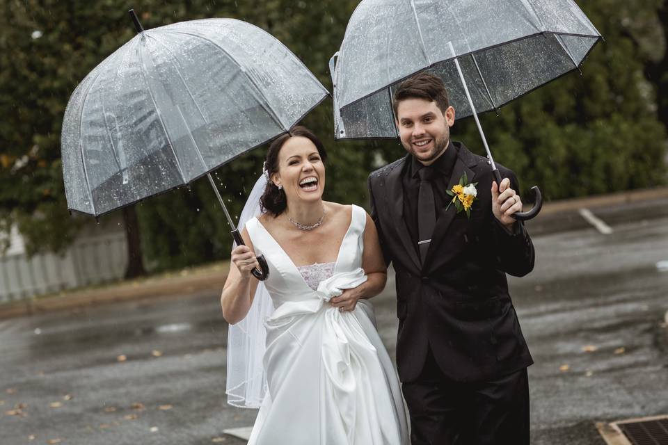 Newlyweds loving the rain!